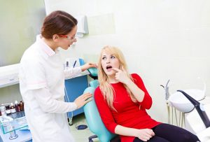 Which is better root canal or extraction?